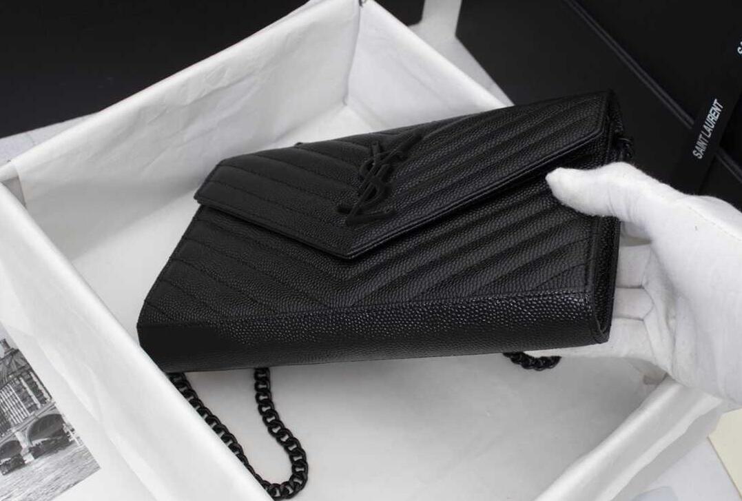 CASSANDRE SAINT LAURENT MATELASSÉ CHAIN WALLET IN GRAIN DE POUDRE EMBOSSED LEATHER